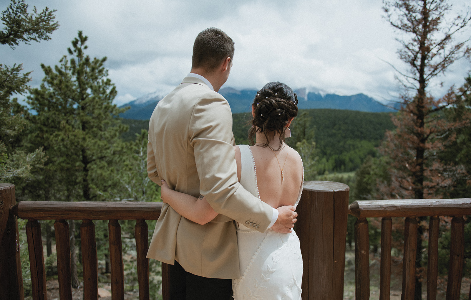 couple overlooking Pikes Peak on their elopement day