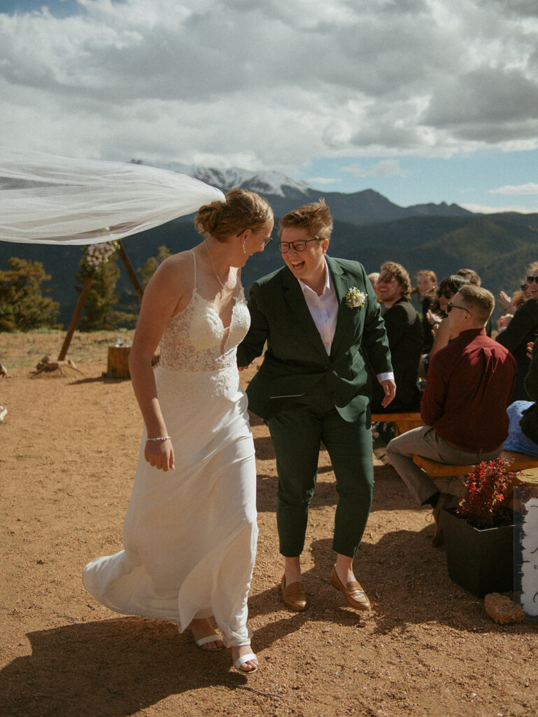 a couple during their wedding ceremony at a Airbnb micro wedding venue in Colorado