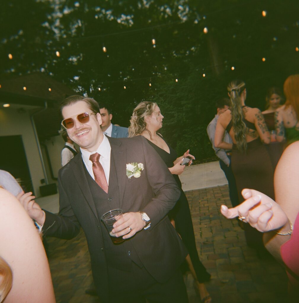 a guest socializing during wedding cocktail hour