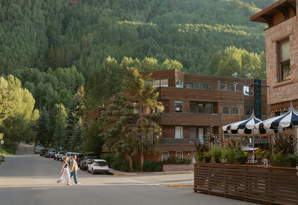 a couple walking in telluride the night before their wedding